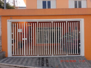 Portões de Ferro Galvanizado portao de tubo redondo galvanizado com detalhe artistico