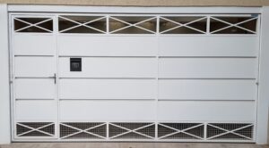 Portões de Chapa no ABC portão de chapa galvanizada com detalhe em tela