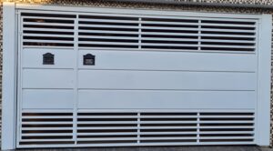 Portões Basculantes no ABC portão de ferro tubular com chapa